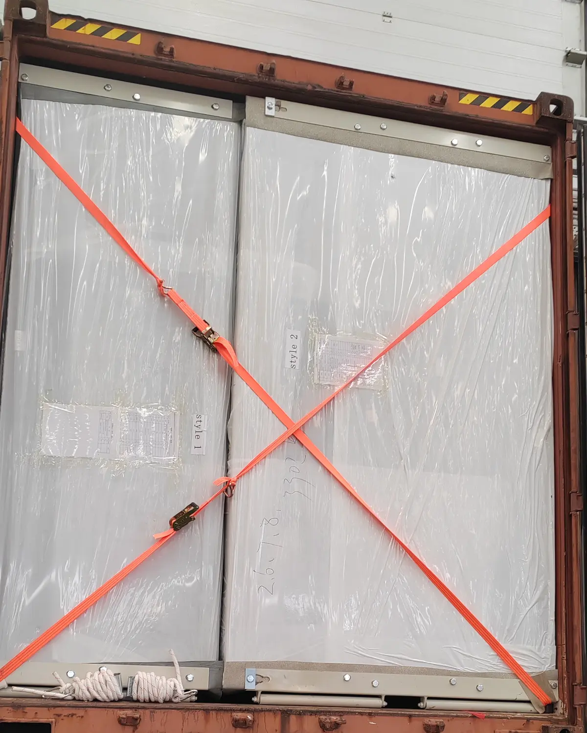 Protected components secured inside a shipping container