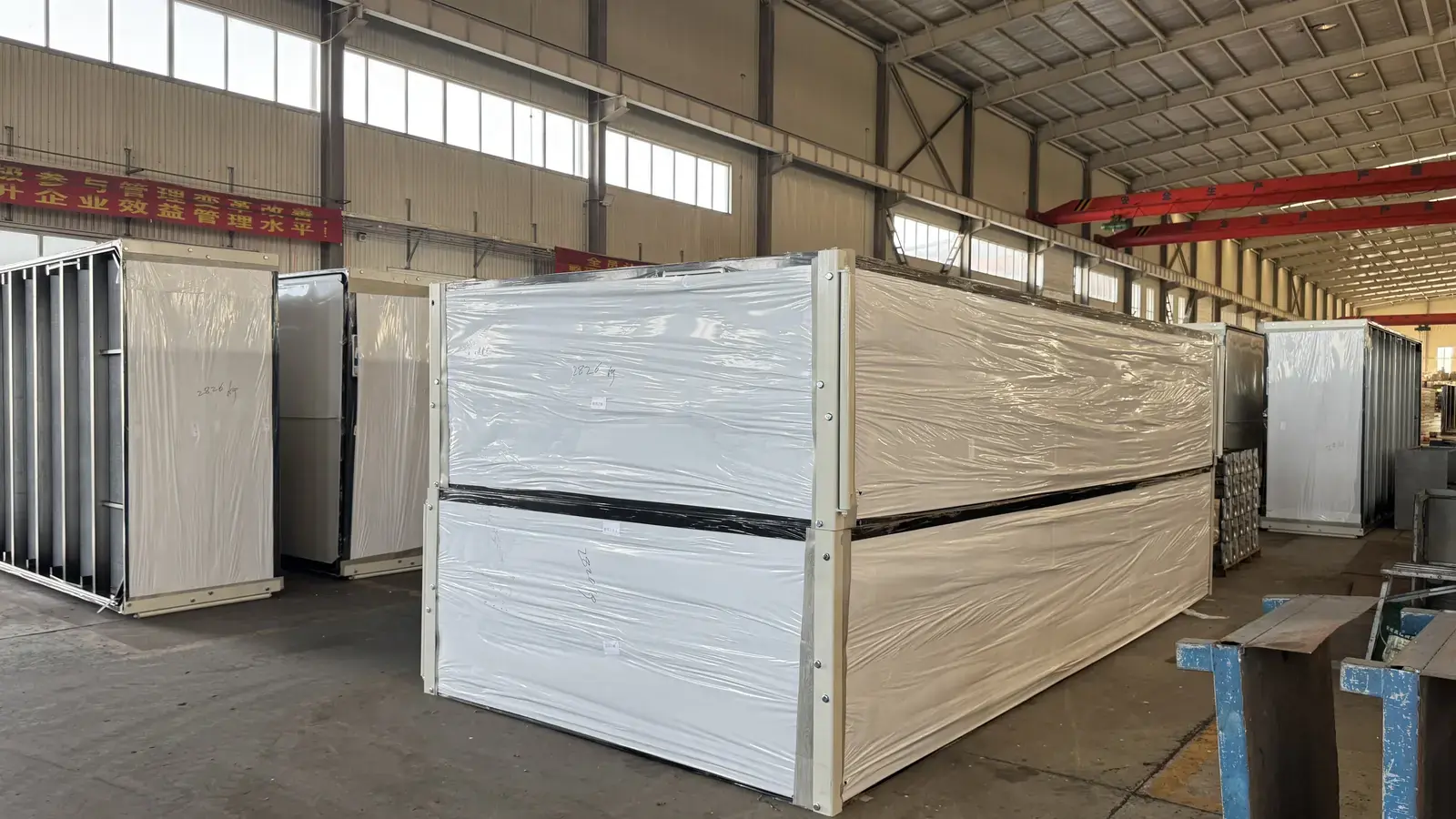 Modular building units protected and packed at the factory