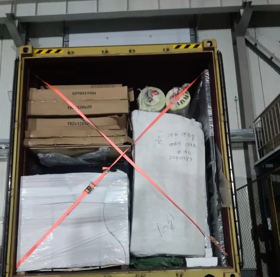 Protected modular components being loaded for shipment
