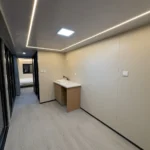A70 apple cabin interior with a fitted counter and perimeter ceiling lighting