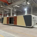 Factory view of the public restroom apple cabin and its central entrance