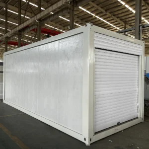 Flat pack storage container with a roller shutter door