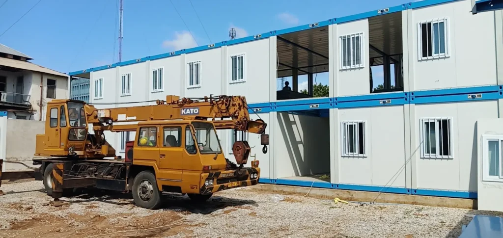 Crane beside modular buildings during Tanga Port camp installation