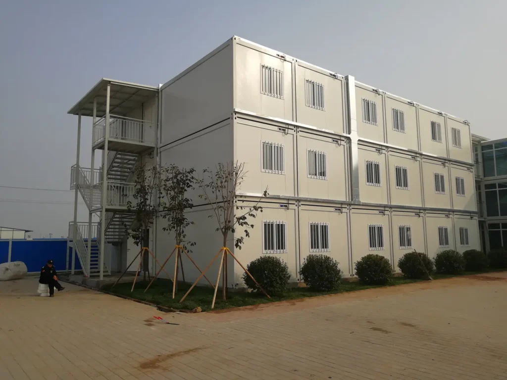 Three-storey modular building with external stair at the project site