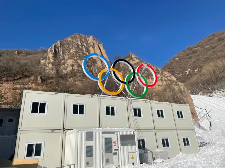 Beijing 2022 Yanqing modular buildings below the Olympic rings