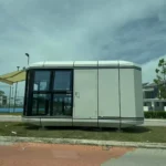 Side profile of the light-panel capsule showing the glazed end and exterior awning