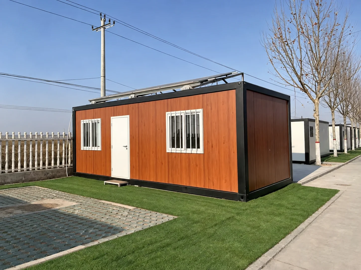 Timber-look detachable container house with windows and a white door