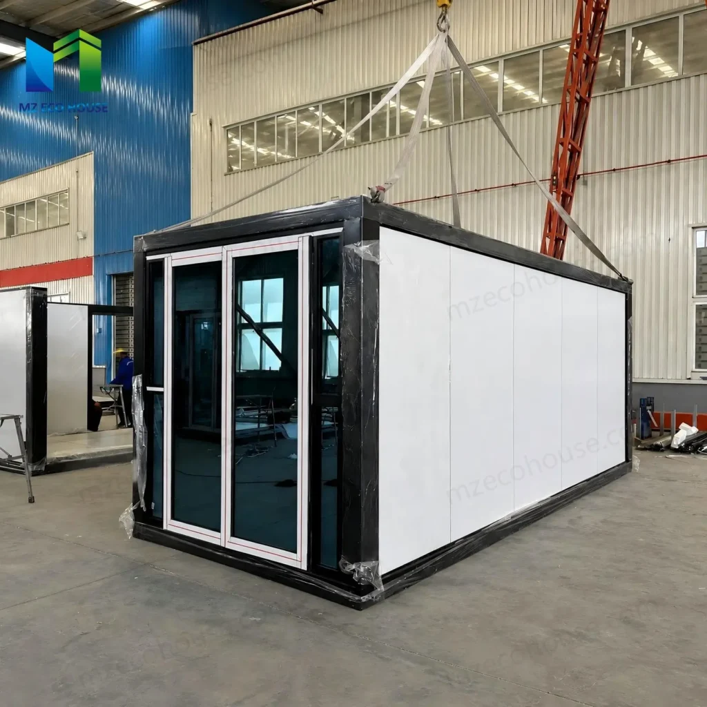 Standard Z-type folding container house with black frame and glass entrance