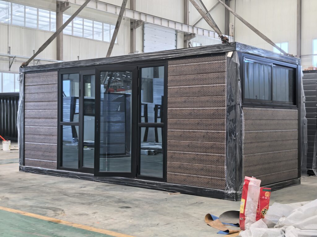 Prefab container house with wood-grain cladding and full-height glass facade by MZ ECO HOUSE